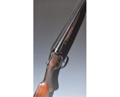 Gecado 16 bore side by side shotgun with chequered semi-pistol grip and forend, raised cheek piece, sling suspension loops, d