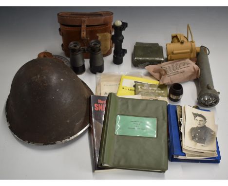 Small collection of militaria including spark proof torch, signalling lamp, first aid kit, instruction manuals, LMG Bren gun 