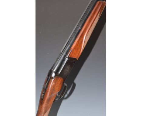 Baikal 12 bore over and under ejector shotgun with engraved lock, trigger guard and underside, chequered semi-pistol grip and