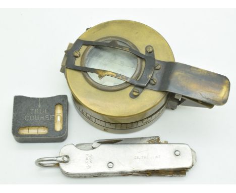 WW2 compass with T G Co Ltd London Mk III dated 1941, together with a small navigational aid and a WW2 clasp knife with broad