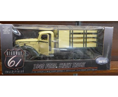 A Highway 61 Collectibles 1940 Ford Stake Truck, boxed, 1:16 scale