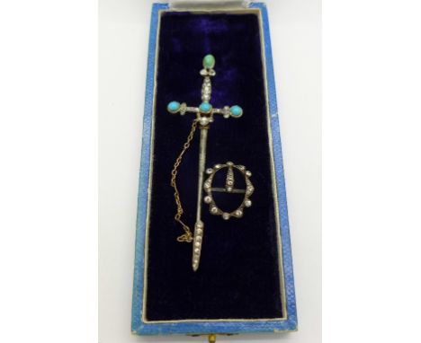 A silver and turquoise set cloak pin and a paste buckle