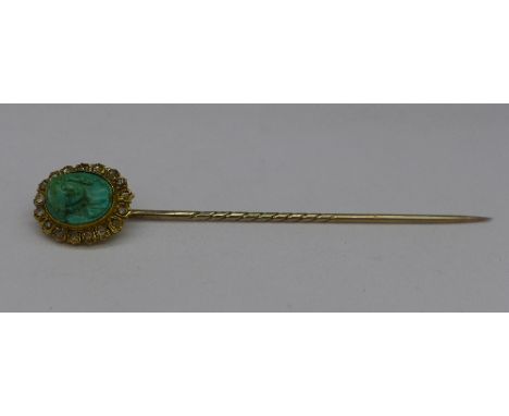 A yellow metal set, turquoise cameo and diamond stick pin, set with seventeen old cut diamonds, boxed