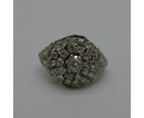 An 18ct white gold and diamond ring, approximately 1.3carat diamond weight, total weight 7.6g, K