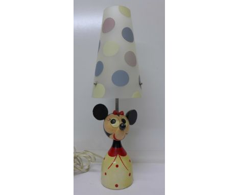 A painted wooden Minnie Mouse table lamp base with later shade