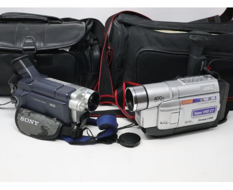 Sony handycam video camera and a JVC example with accessories. P&amp;P Group 1 (£14+VAT for the first lot and £1+VAT for subs