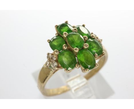 9ct gold cluster ring set with emeralds and diamonds, size N/O, 2.3g. P&amp;P Group 1 (£14+VAT for the first lot and £1+VAT f