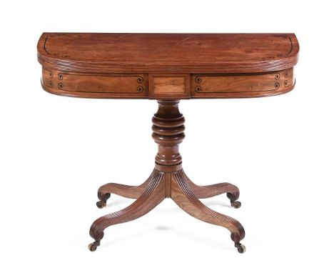 Y A REGENCY EBONY INLAID MAHOGANY CARD TABLEEARLY 19TH CENTURY, POSSIBLY BY WILLIAM TROTTERThe D-shaped swivelling top enclos