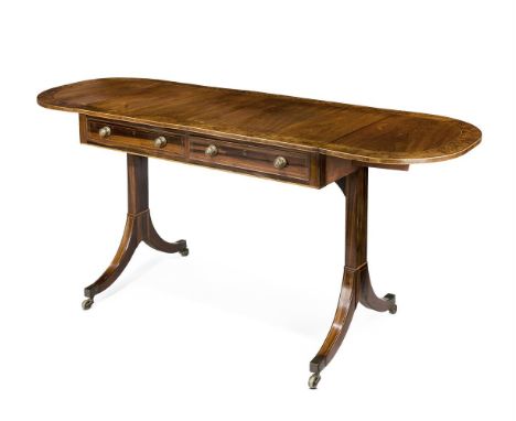 Y AN UNUSUAL REGENCY PADOUK AND BURR YEW CROSSBANDED SOFA TABLE CIRCA 1815 Boxwood strung throughout72.5cm high, 96cm wide (w