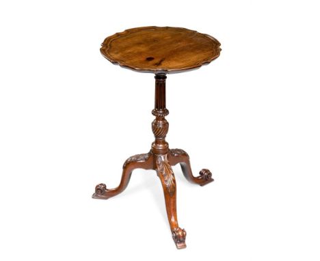 AN EARLY GEORGE III MAHOGANY CANDLE STAND IN THE MANNER OF THOMAS CHIPPENDALE, CIRCA 1760 With 'pie crust' moulded top61cm hi