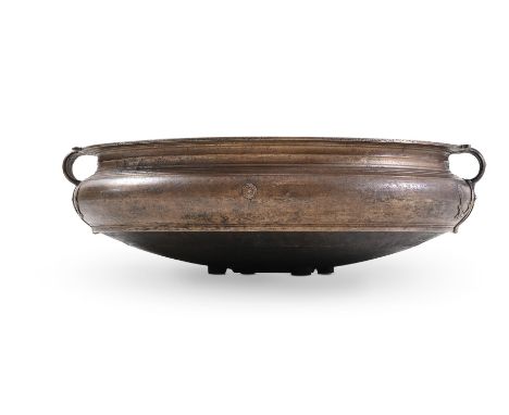 AN ASIAN GILT METAL CENSOR OF TWO HANDLED FORM AND FOUR PEG FEETMODERNapproximately 22cm high, 70cm wide                  SAL