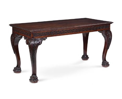 A MAHOGANY SERVING TABLE20TH CENTURY, IN GEORGE II 'CHIPPENDALE' STYLEThe rectangular top above a blind fretwork frieze enclo