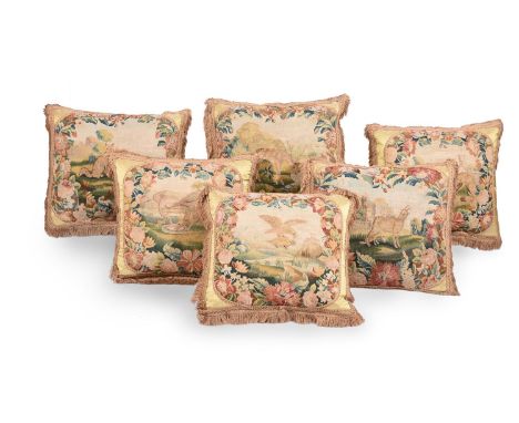 SIX LARGE CUSHIONSINCORPORATING 18TH CENTURY TAPESTRY WITH ANIMALS FROM FABLES AND LATER FABRICThe largest approximately 60cm