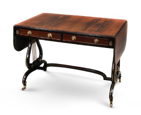 Y A REGENCY ROSEWOOD AND EBONISED SOFA TABLECIRCA 1820Bearing a Norman Adams retail label to the underside 71cm high, 99cm wi