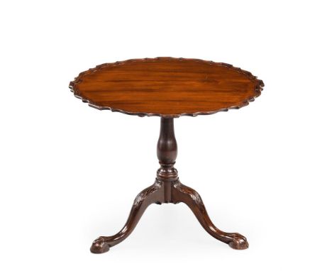 A GEORGE II MAHOGANY TRIPOD TABLE MID 18TH CENTURY, TOP AND BASE ASSOCIATEDThe circular 'pie-crust' shaped edge, on a baluste