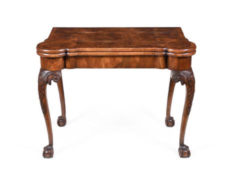 A WALNUT FOLDING CARD TABLE 18TH CENTURY STYLE, PROBABLY EARLY 20TH CENTURYThe top inset with sectional oyster veneers, openi