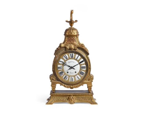 A NAPOLEON III GILT METAL CASED MANTEL CLOCKFRENCH, CIRCA 1865The 26cm gilt metal dial with enamel cartouches with Roman nume