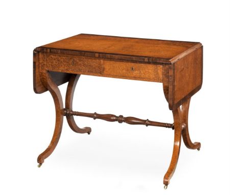 Y AN AMBOYNA SOFA TABLEOF REGENCY STYLE, 20TH CENTURY The rounded rectangular twin flap top crossbanded in rosewood, above tw