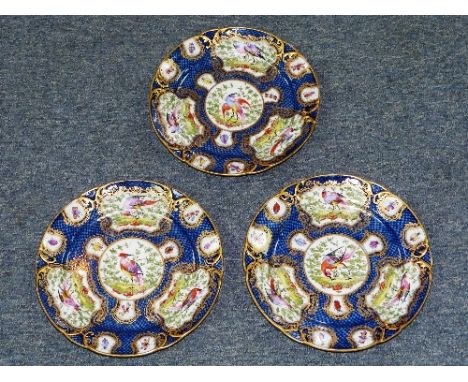 A set of three French Samson porcelain Plates, decorated in the Worcester style, the blue scale ground decorated in coloured 