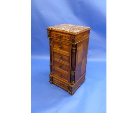 An early 20thC French walnut Commode, the marble top above a frieze drawer, cupboard door enclosing a marble lined interior a