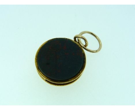 An antique gold and bloodstone Locket, the Spade Guinea hinged cover enclosing a portrait of a gentleman, on suspension loop,