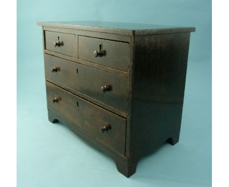 A 19thC mahogany 'apprentice piece' Chest-of-Drawers, the rectangular top above two short and two long graduated drawers, sha