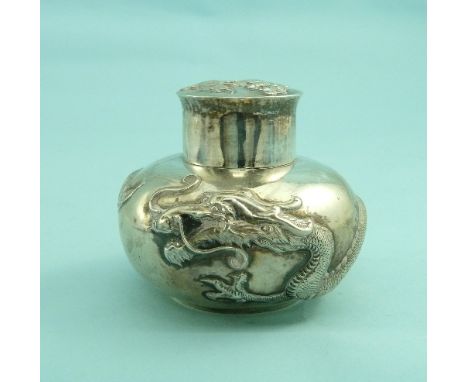 An early 20thC Chinese silver Tea Caddy, by Wang Hing & Co (Hong Kong), of compressed circular form, the body and cover chase