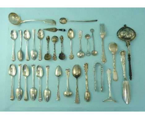 A quantity of mixed silver Flatware, including teaspoons, sugar nips, butter knife, sauce ladle etc. approx total weight 18oz