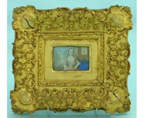 19thC English School Portrait miniature of a Girl watercolour, 2in x 3in (5cm x 7.5cm) in moulded giltwood frame. 