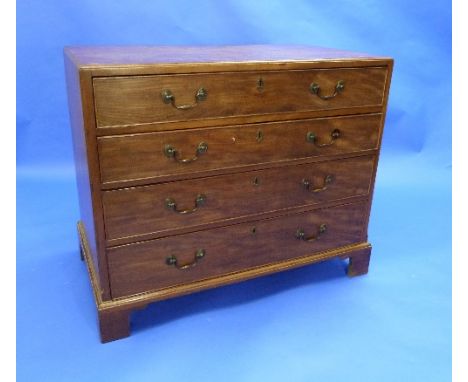 A 19thC mahogany Gentleman's Dressing Chest, the rectangular top above four long graduated drawers, the top drawer with brush