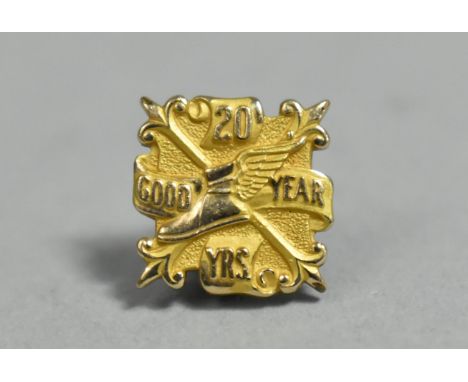 A Small 10k Gold Plated Goodyear 20 Years Commemorative Lapel Badge