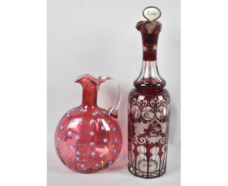 A Bohemian Overlaid Ruby Glass Decanter with Cork having Mother of Pearl Label for Rum, Together with a Cranberry Glass Flask