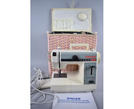 A Singer Compact Free Arm Sewing Machine in Carry Case with Removable Tray Containing Tools and Instruction Manuel for Model 