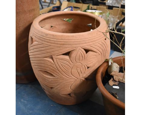 A Terracotta Garden Planter of Pierced Barrel Form, 42cms High 