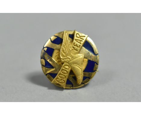 A Small 10k Gold Plated Goodyear Commemorative Lapel Badge