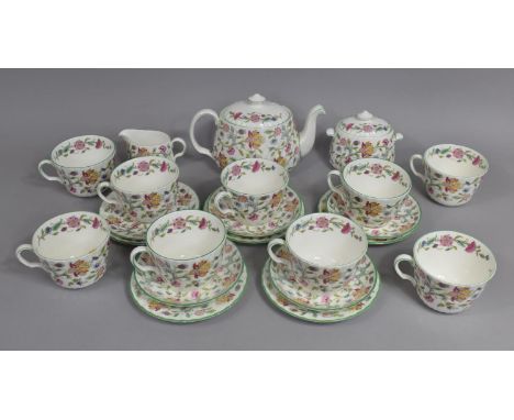 A Minton Haddon Hall Tea Set to comprise Nine Cups, Four Plus One Saucers, Five Side Plates, Milk Jug and a Sugar Bowl 