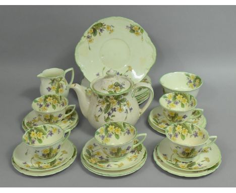 A Royal Doulton April Tea Set to comprise Cups, Saucers, Side Plates, Cake Plate, Small Plates, Sugar Bowl, Tea Pot (Conditio