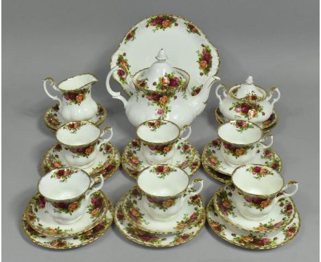 A Royal Albert Old Country Roses Tea Set to comprise Teapot, Six Cups, Milk Jug, Lidded Sugar, Ten Saucers, Six Saucers and a