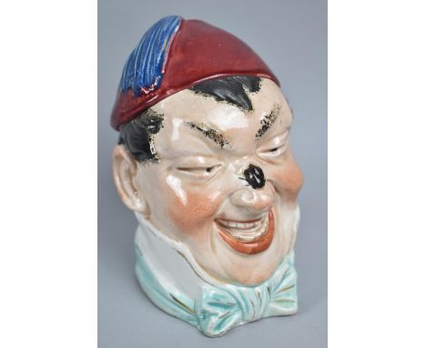 A Continental Glazed Bisque Tobacco Pot of Novelty Form in the Form of a Bust of Gent with Insect on Nose, 14cms High 