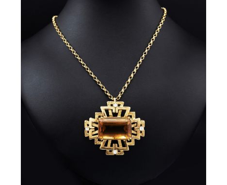 A 9CT GOLD CITRINE SET PENDANT NECKLACE AND CHAIN, single large step cut citrine mounted on a cross, with white stones, with 
