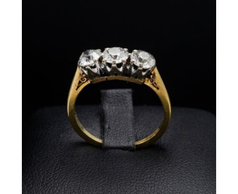 AN 18CT GOLD DIAMOND TRILOGY RING, with three claw set round brilliant diamonds, each of approximately 0.25 carats, total car