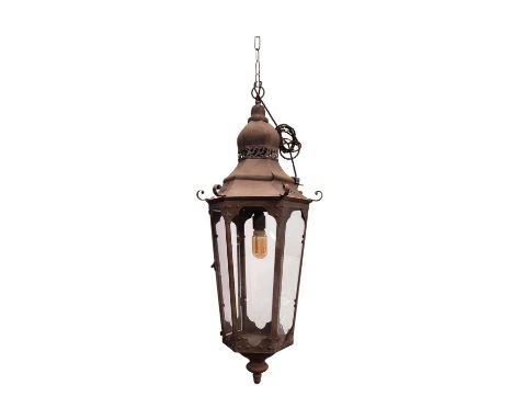 A PAIR OF HANGING WALL LANTERN LIGHTS, antiqued oxidised frames, hexagonal frames, 75cm H. (2)