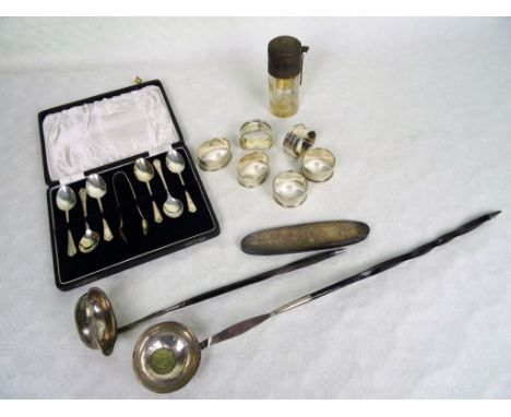 A mixed lot of silver and silver plate, to include: napkin rings, toddy ladles, cased flatware and other items.