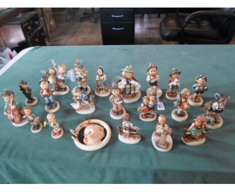 A collection of 21 Hummel figurines, to include: The Ba-bee Ring wall plaque, Lost Sheep, Wayside Harmony, Boy with Horse, Ch
