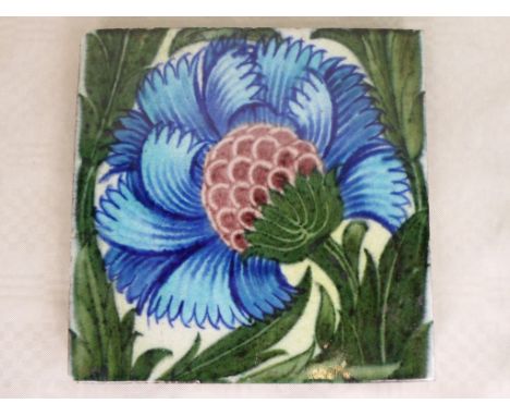 A William de Morgan BBB polychrome painted tile of Ruffled Petals design, impressed DIP mark to reverse, for de Morgan, Iles 