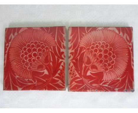 A pair of William de Morgan ruby lustre tiles, featuring a version of the BBB pattern, having an oval de Morgan Fulham stamp 