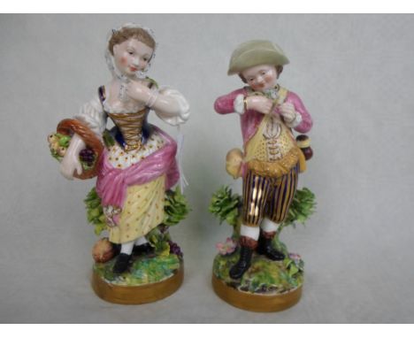 A pair of late 19th century Derby porcelain figurines, decorated throughout in polychrome enamel, puce Stevenson & Hancock, D