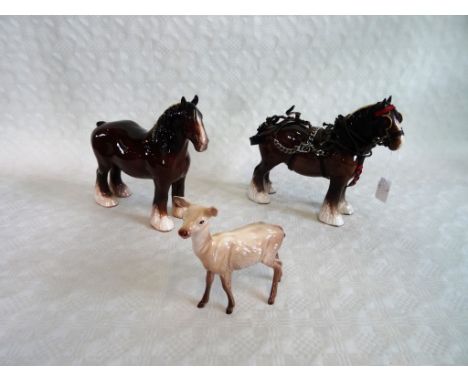 A Beswick shire mare, brown gloss finish with harness, no. H818, together with a further unharnessed shire mare, no. 818 and 