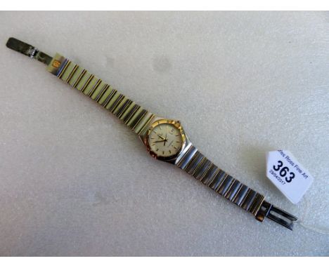 A lady's Omega Constellation wristwatch, the circular dial bearing baton numerals, date adjust and sweep seconds hand, with o