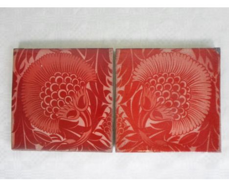 A pair of William de Morgan ruby lustre tiles, featuring a version of the BBB pattern, having an oval de Morgan Fulham stamp 